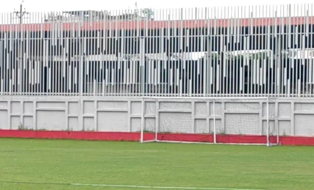 Football goal set directly against the tube facade
