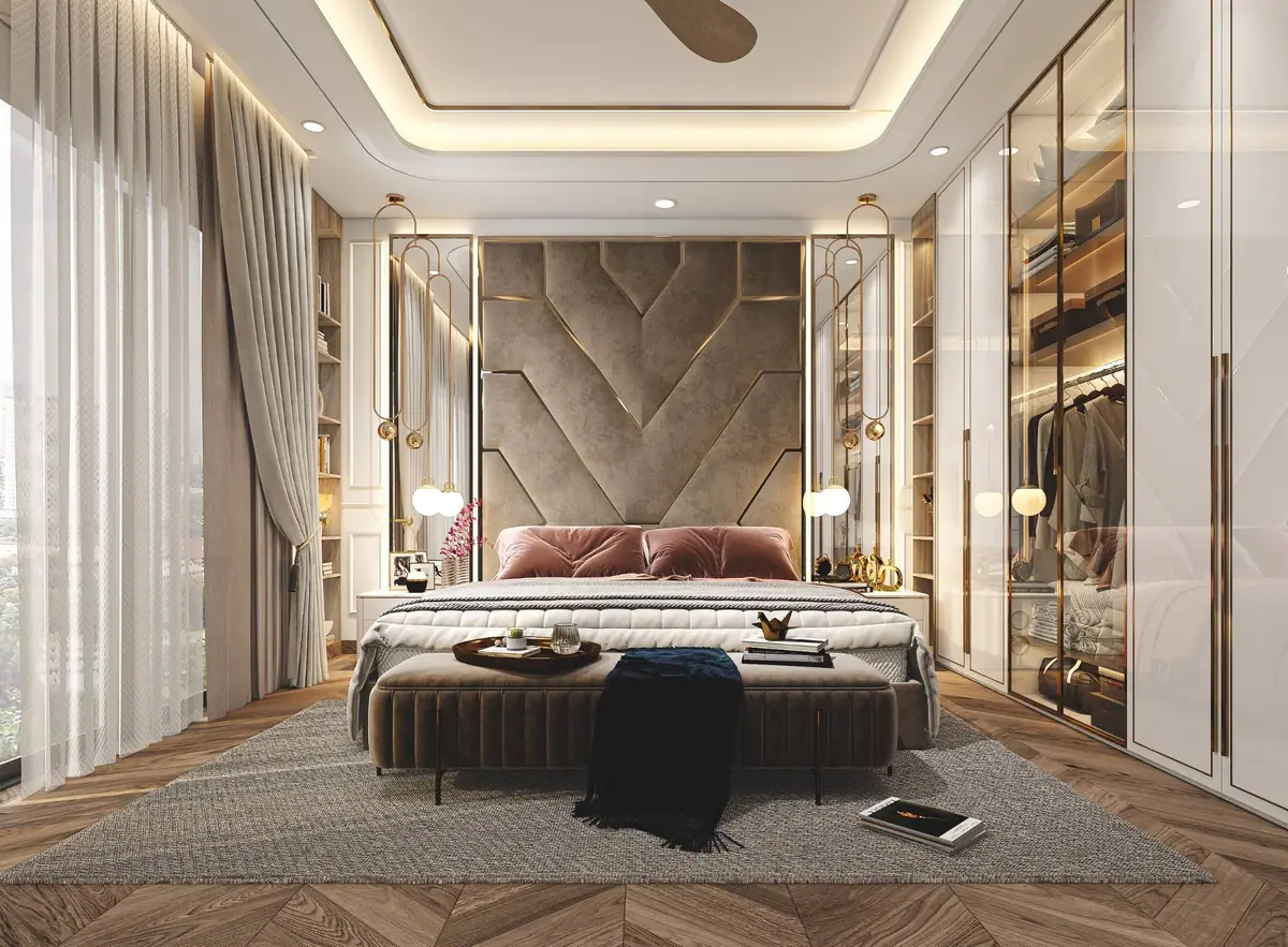 Master bedroom: faceted upholstered headboard framed in brass, globe pendants and a herringbone timber floor