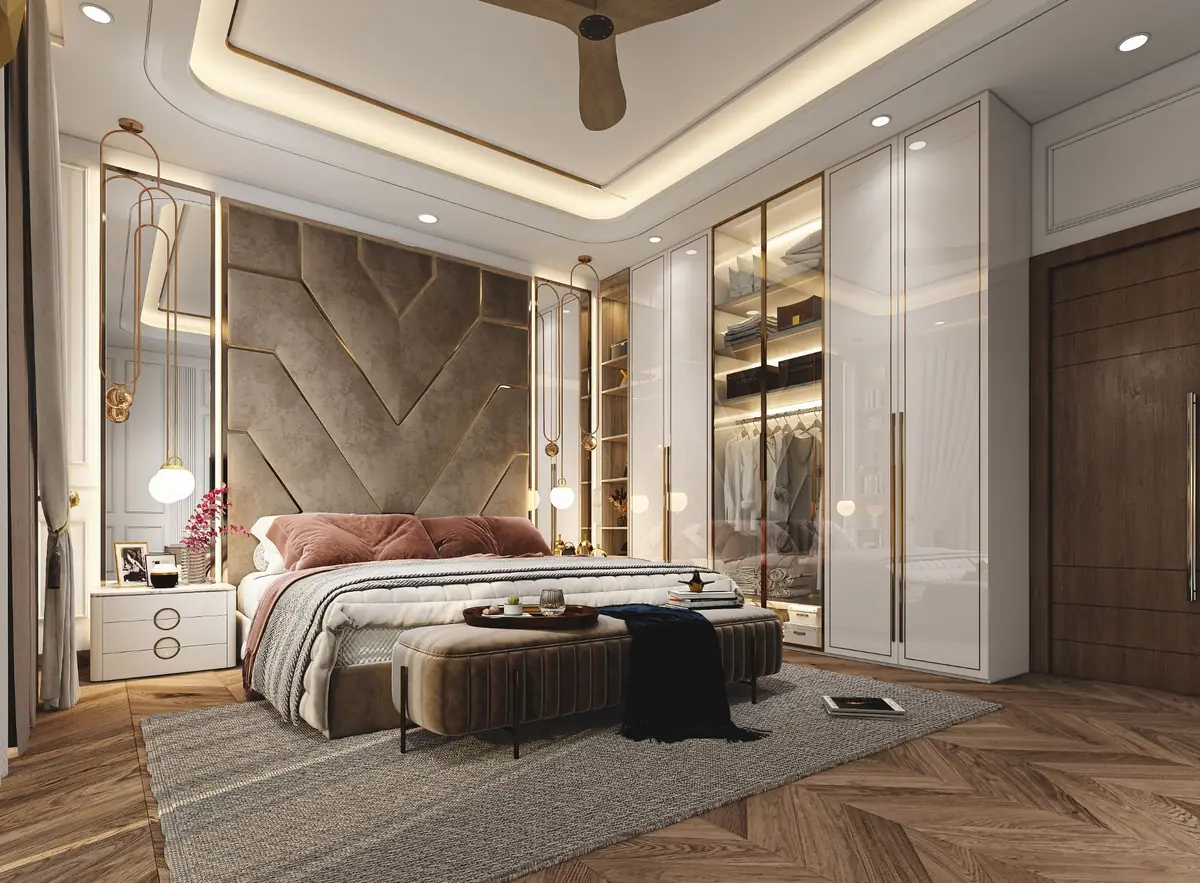 Master bedroom with glass-fronted, lit wardrobes beside the bed