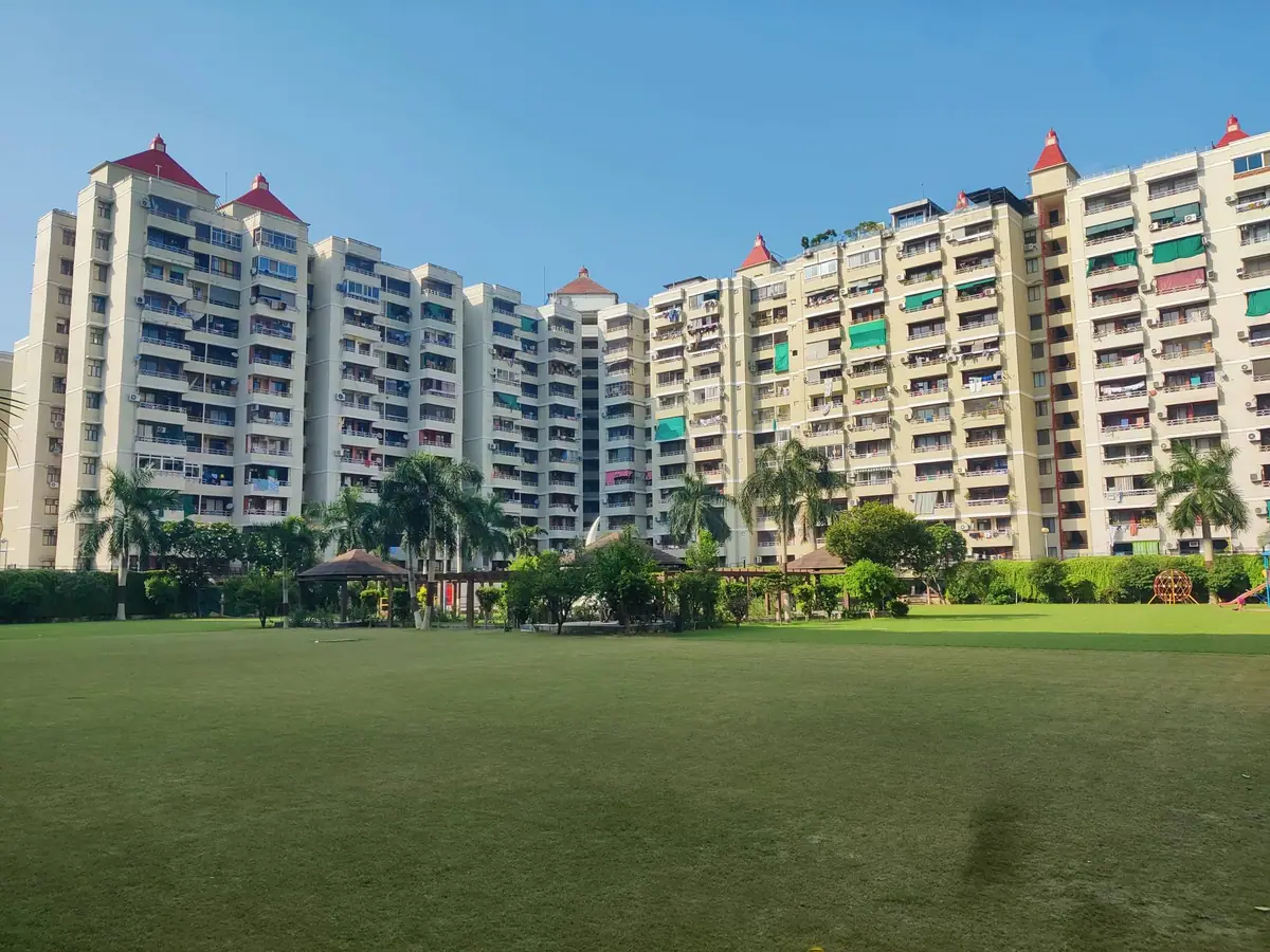 Ratan Orbit towers rising above the central lawn under a clear sky