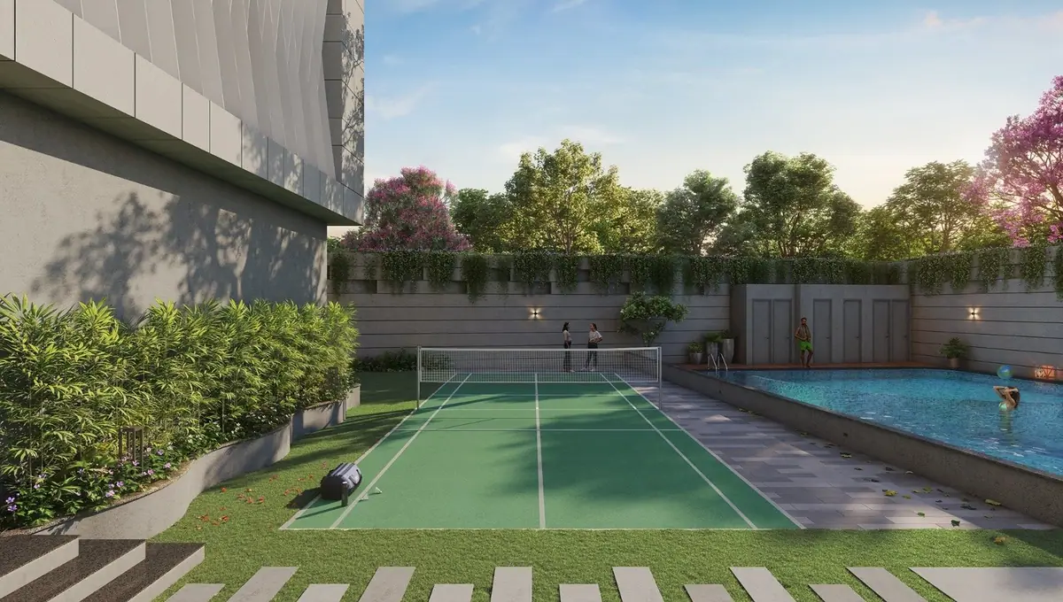 Badminton court beside the pool in landscaped grounds